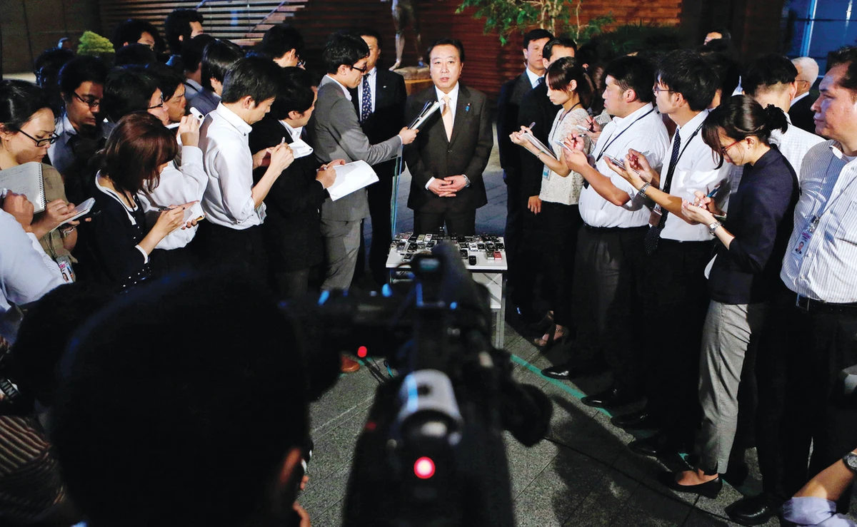 Dozens quit Japan’s ruling party in blow to PM