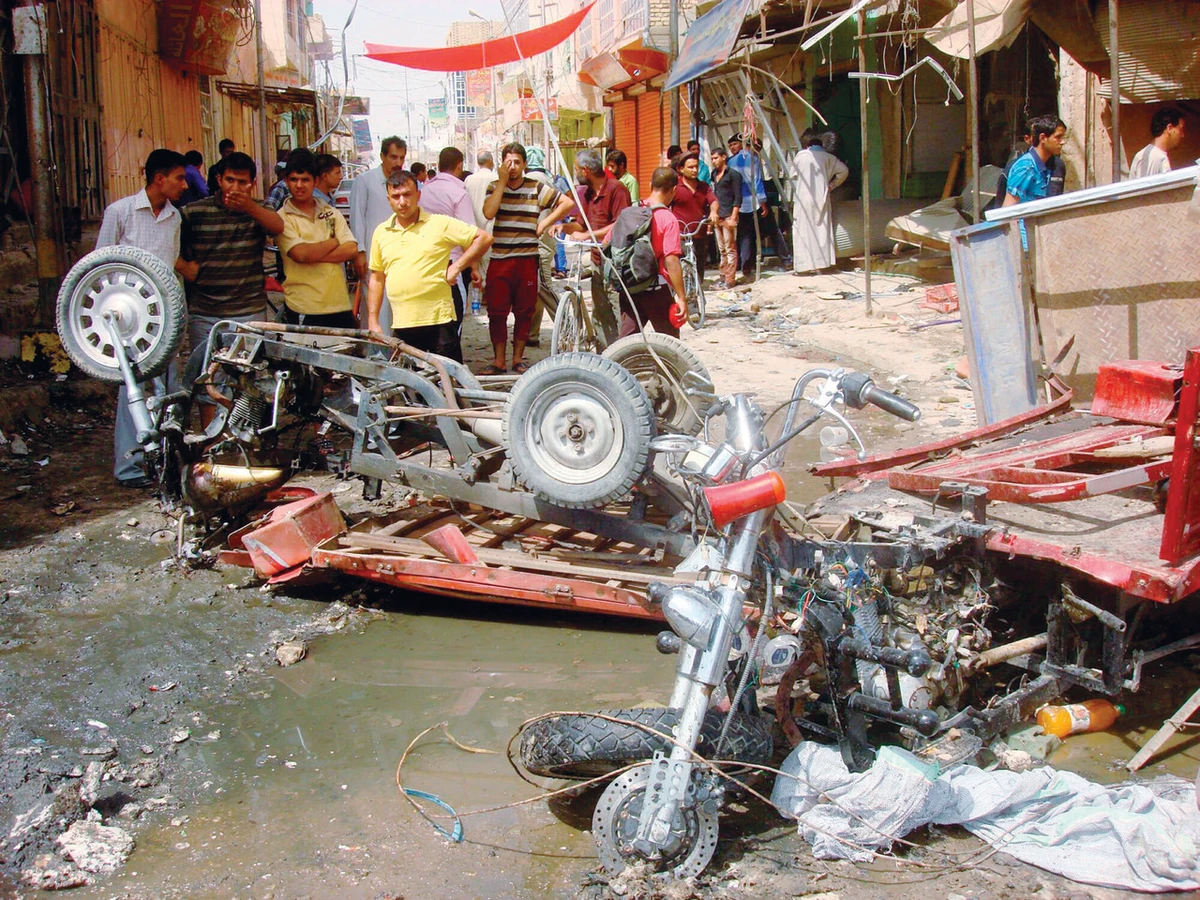 Blasts rock Iraq; scores die