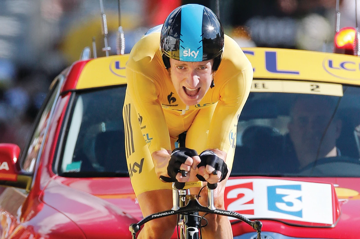 Wiggins pads lead with big time trial win