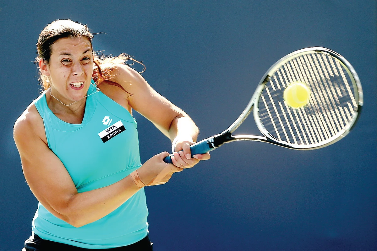 Bartoli finds winning touch against Burdette