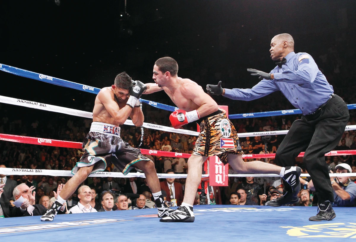 Garcia stuns fancied Khan in 4th round