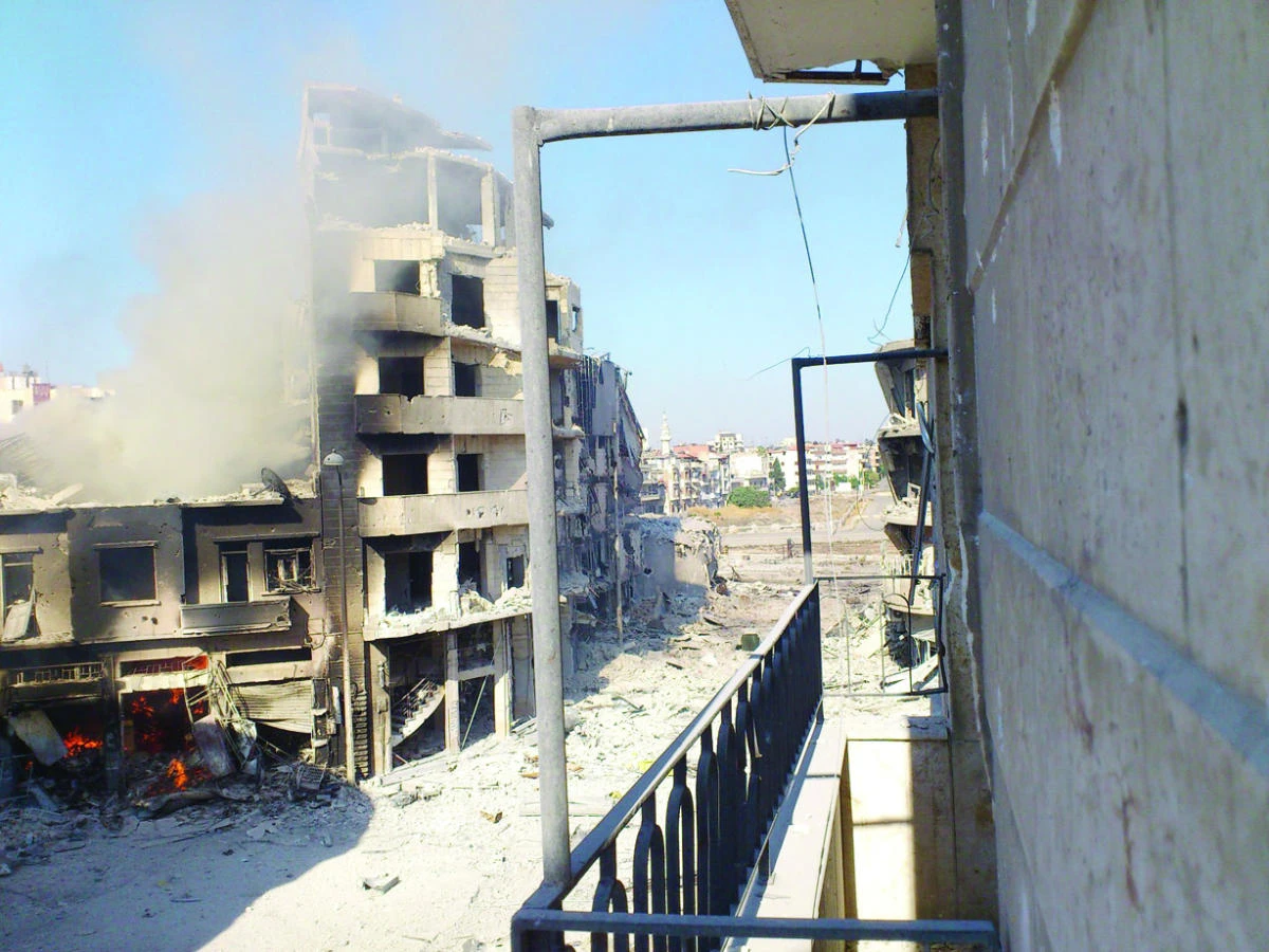 Syrian forces pound Aleppo and Damascus