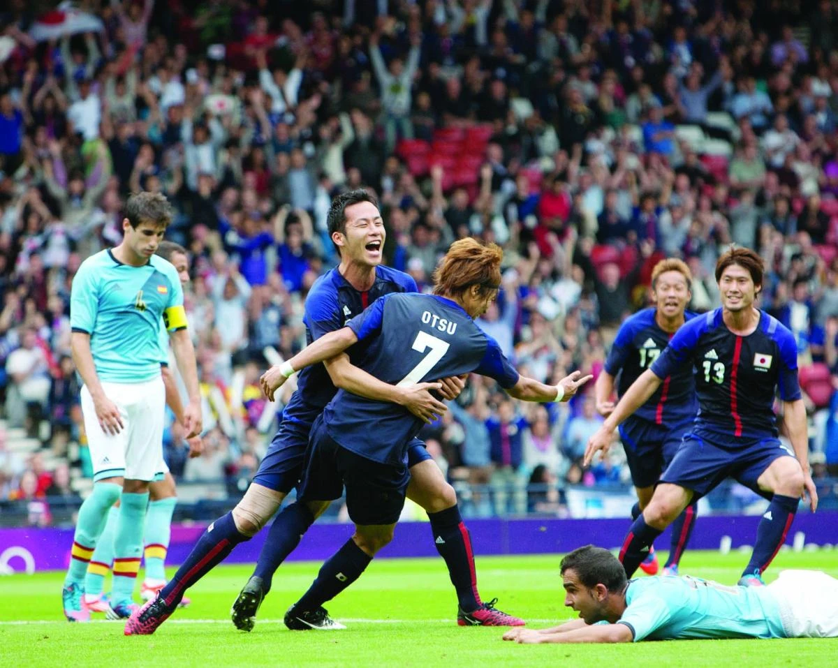 Japan stuns Spain in soccer opener