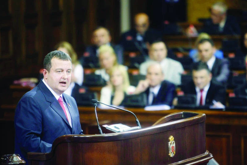 Former Milosevic spokesman takes power in Serbia