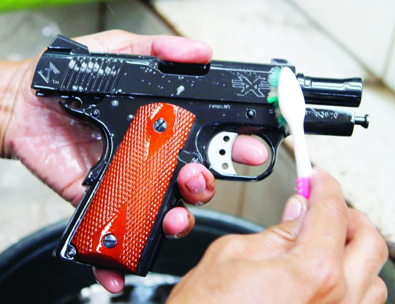 Philippine gunmakers take aim from backyard to production line