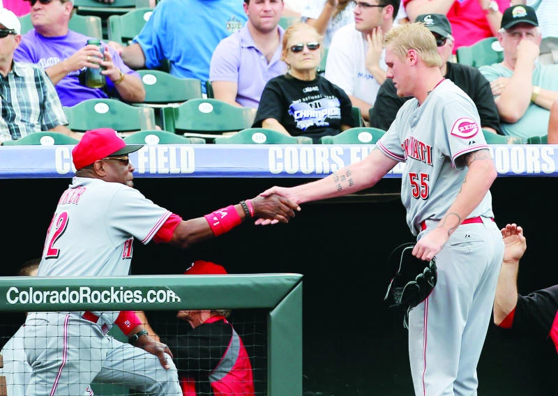 Reds roll to 10th straight win, beat Colorado Rockies 7-2