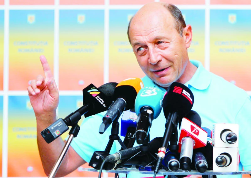 Romania's Traian Basescu survives impeachment vote