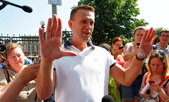 Top Putin foe Navalny charged with embezzlement