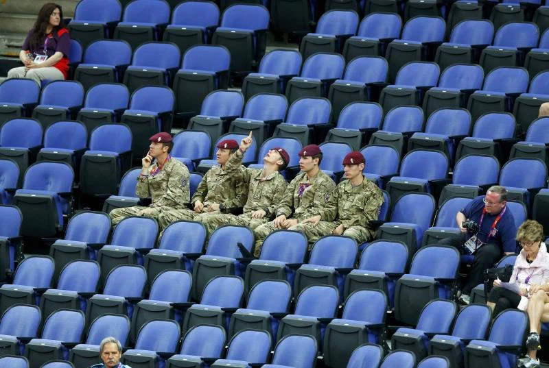 Troops, students to fill empty seats at Olympics