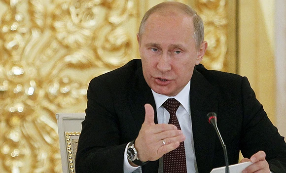 Putin warns of long civil war in Syria if Assad ousted