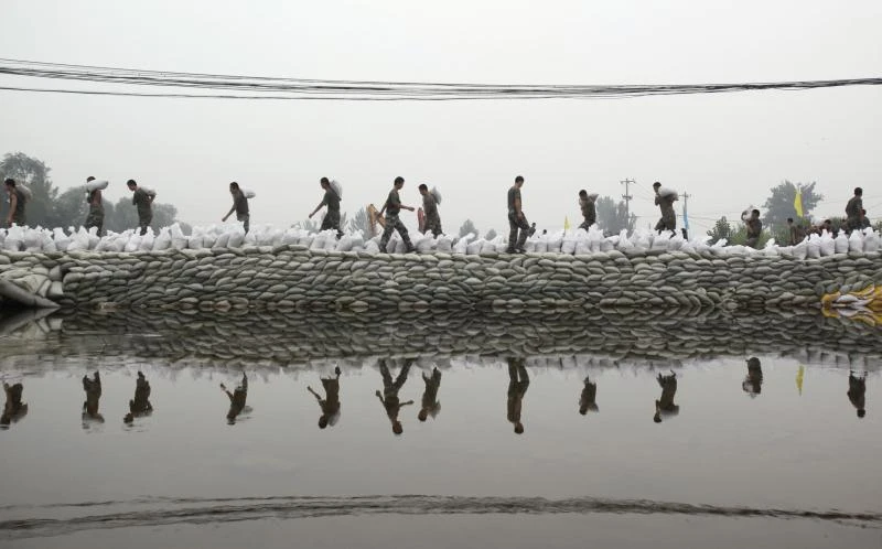 Rumors swirl over flooding death toll in Beijing