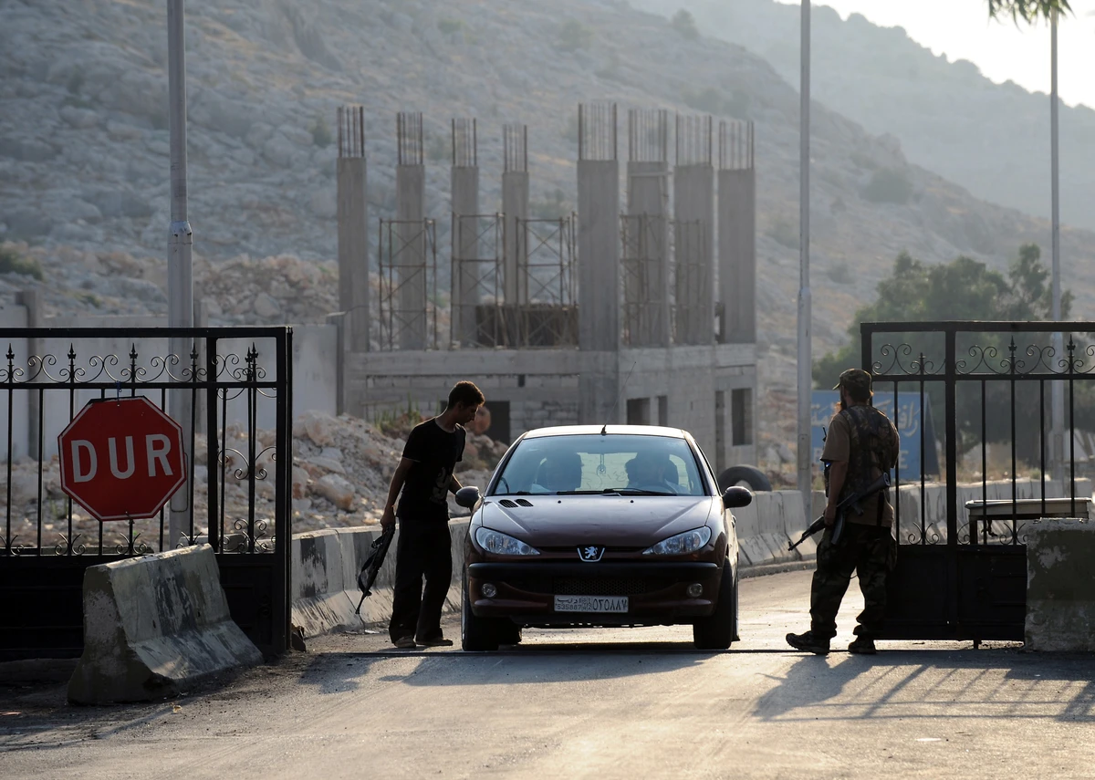 Turkish truck drivers accuse rebel fighters of looting