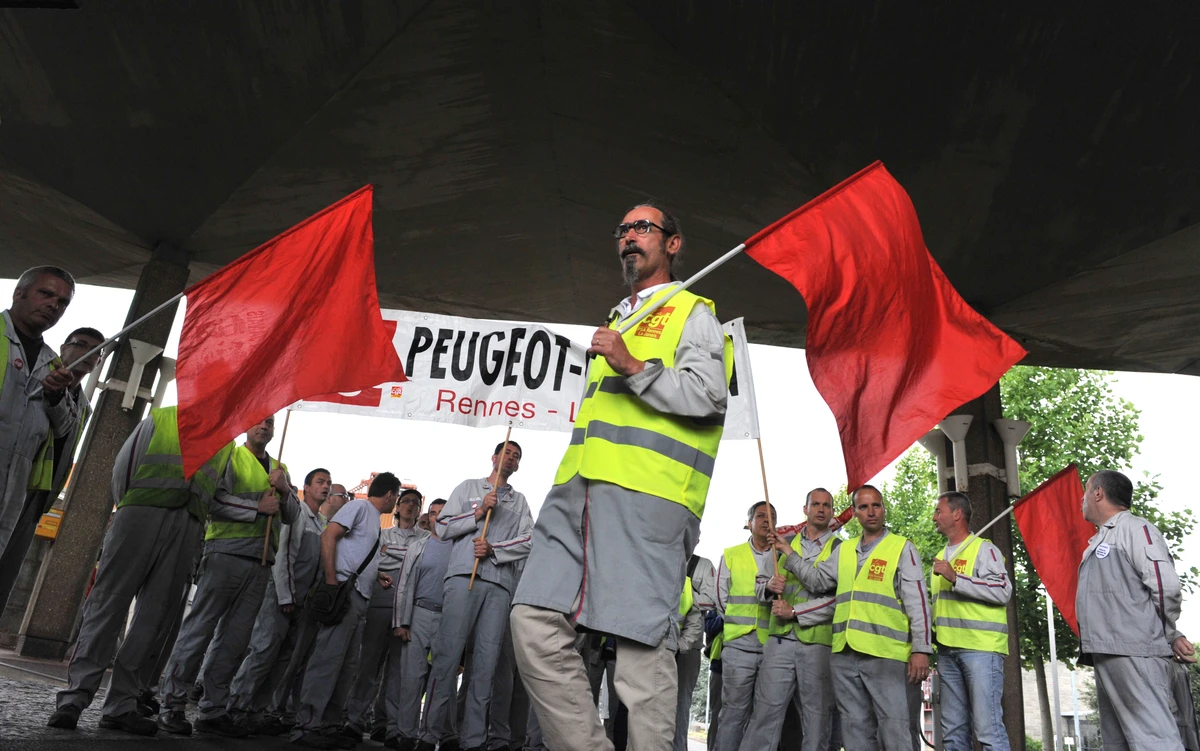 French president says Peugeot plan is unacceptable, seeks renegotiation