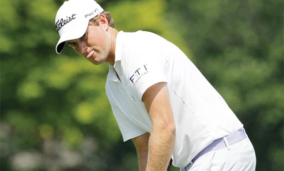 Simpson leads as Woods, Mickelson miss cut