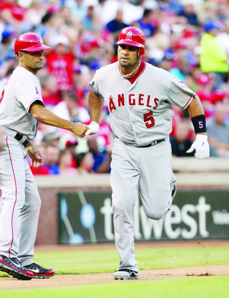 Pujols powers Angels to 6-2 win over Rangers