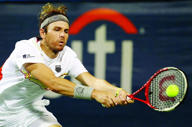 Fish survives three-setter, Haas advances at Citi Open