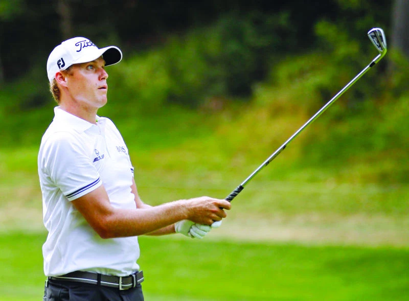Watney, Garcia share lead; Woods in hunt