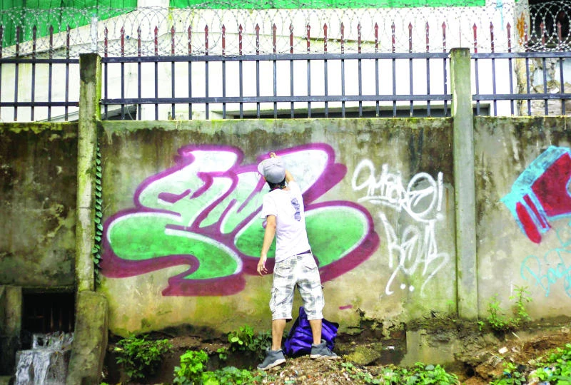 Myanmar’s street artists fight paint wars with a cause