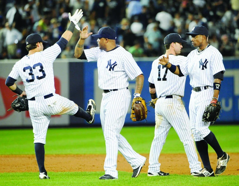 Hughes, Swisher star in Yanks win over Jays