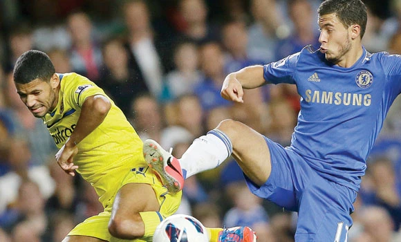 Chelsea fights back to beat newcomer Reading 4-2