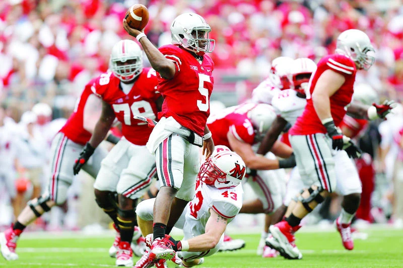 Miller stars as Buckeyes romp past Miami 56-10