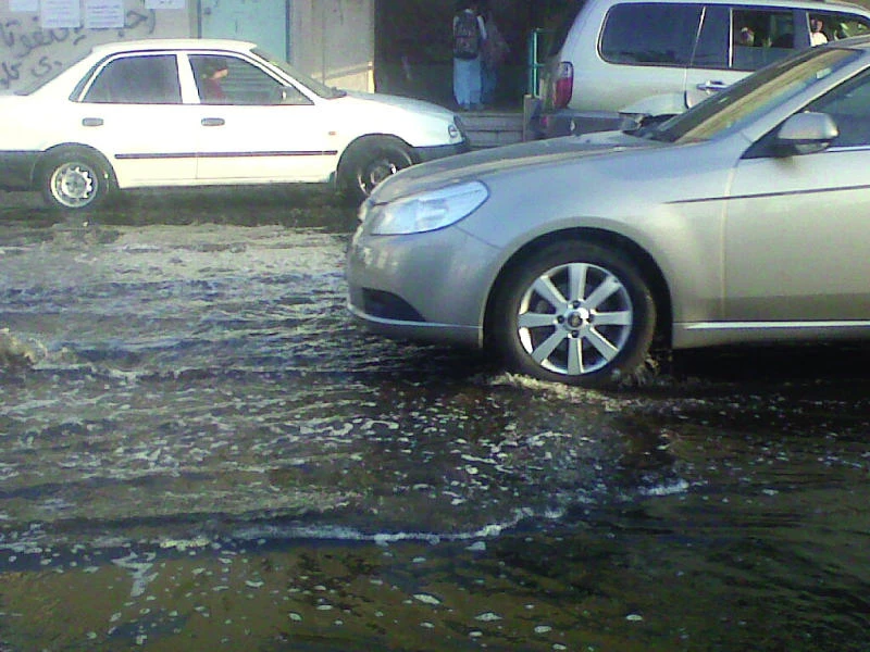 Schoolgirls brave flood of sewage