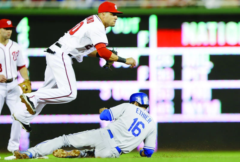 Nationals, Reds clinch playoff spots