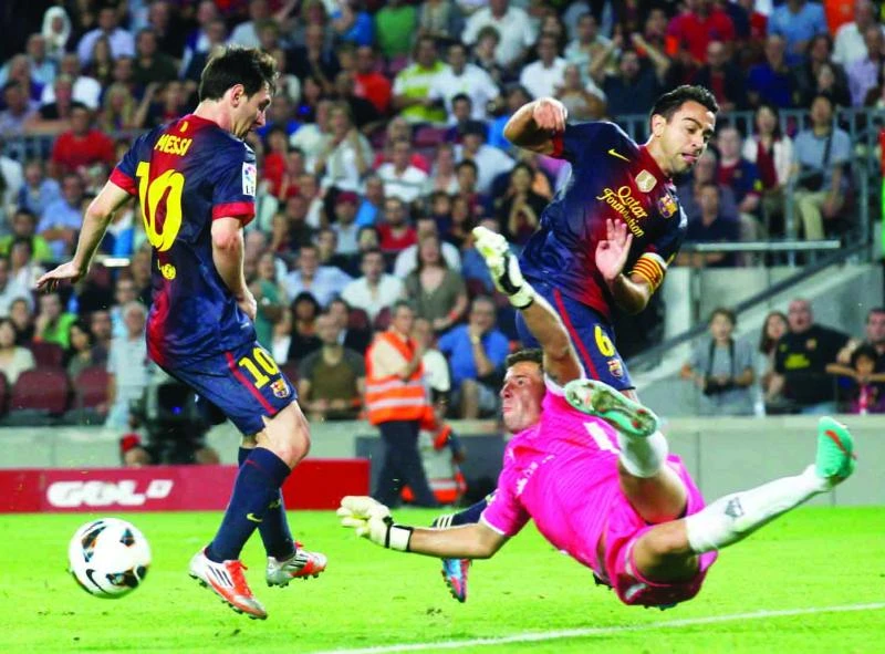 Barca late show puts pressure on Real Madrid
