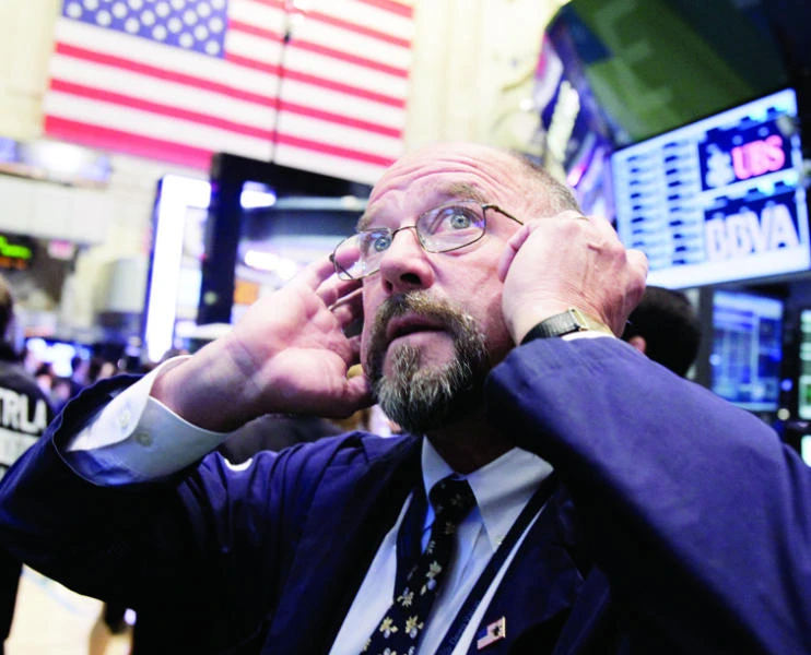 Wall Street: Stocks face earnings and data hurdles