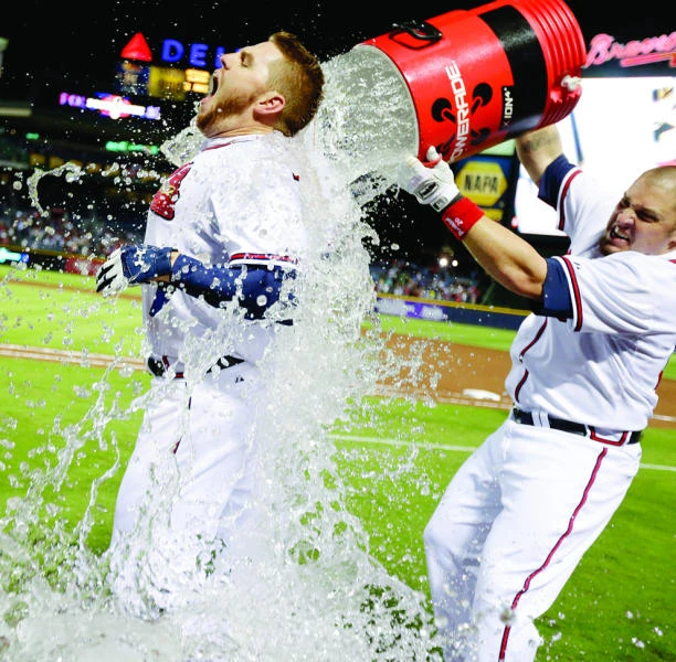 Freeman gets redemption as Braves make playoffs