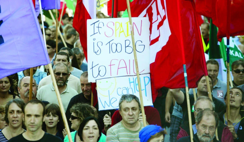 Spain unveils austerity budget as bailout looms