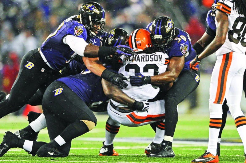 Ravens hold on to beat Browns as refs return