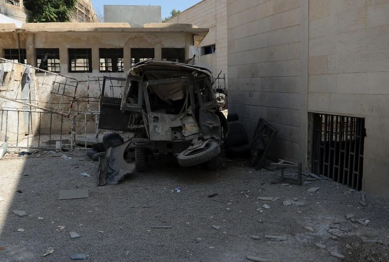 Twin blasts rock Damascus security compound
