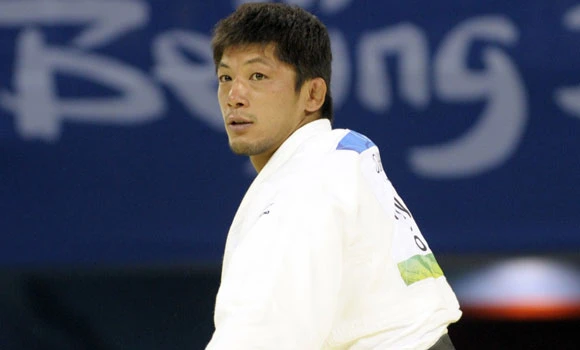 Japan judo champ pleads innocent in rape trial