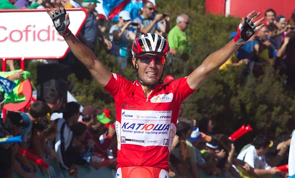 Rodriguez wins 14th stage to bolster lead