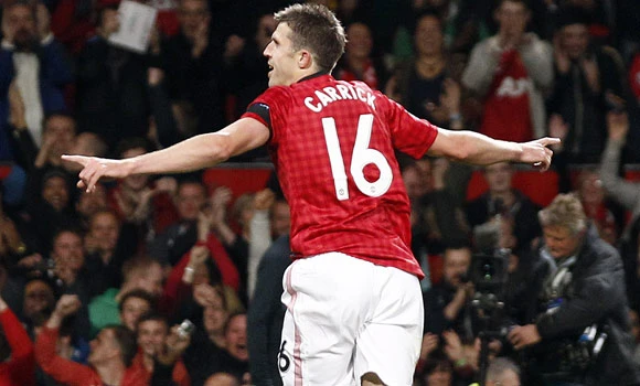 Carrick calls for calm as United heads to Anfield