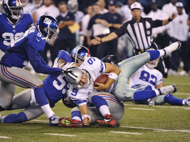 Romo shines as Cowboys win NFL opener