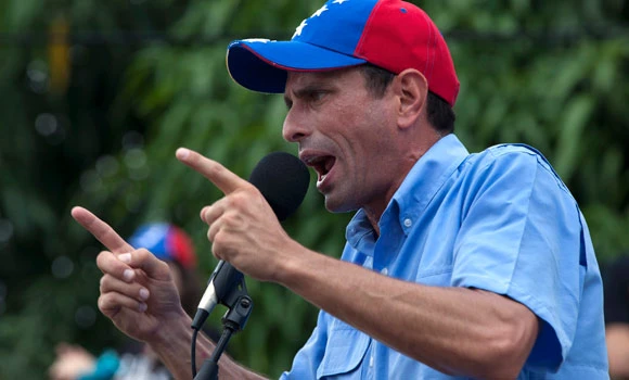 Venezuela’s Capriles mocks Chavez election manifesto