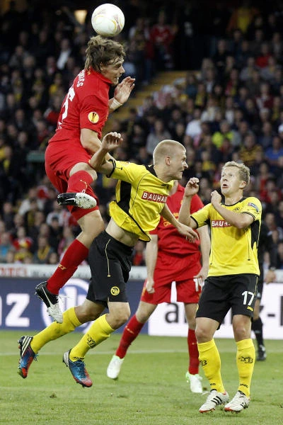 Liverpool wins thriller; Spurs, Newcastle held
