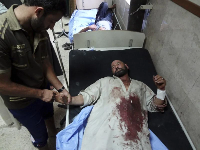 Bombs, house raids in Iraq leave 18 dead