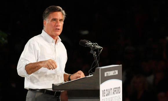 Romney shows softer side; Obama raising more cash