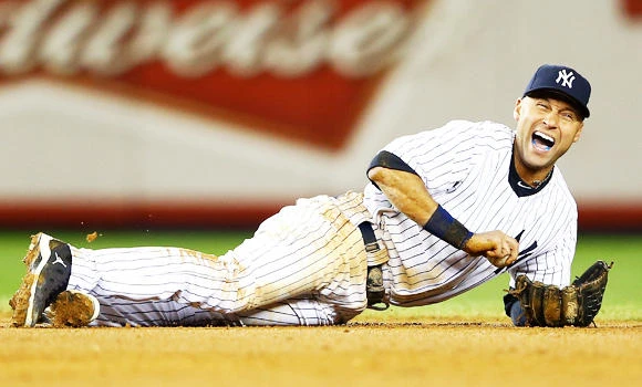 Tigers rally in 12th, Jeter breaks ankle
