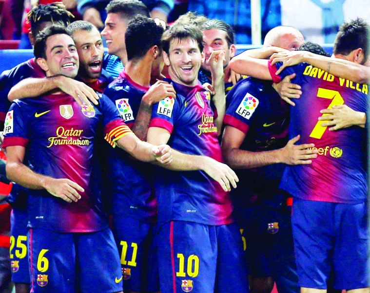 Villa’s late winner saves Barca the blushes against Sevilla
