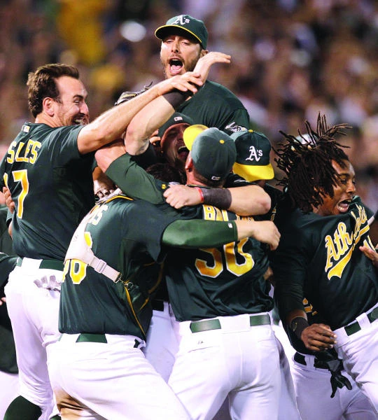 Tigers, A’s secure MLB playoff berths
