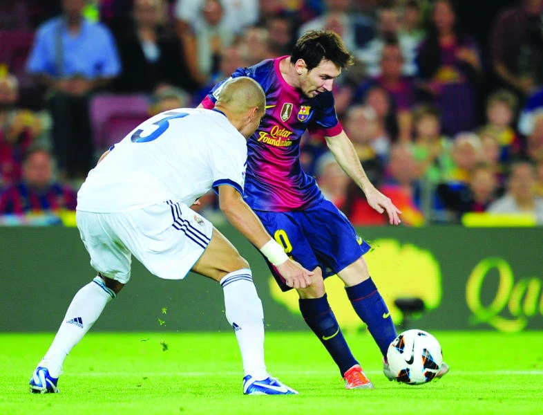Messi, Ronaldo at the double; Milan slumps