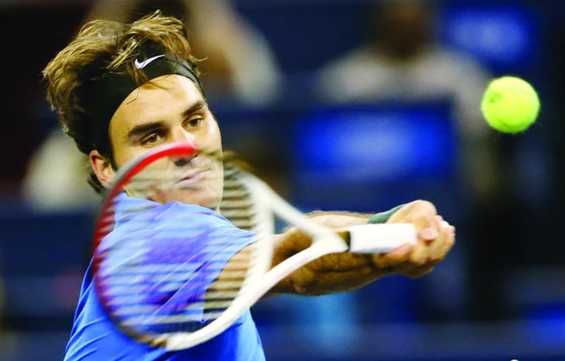 Federer advances to 3rd round at Shanghai Masters