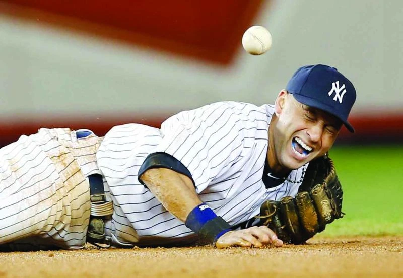Jeter injured, Young stars as Tigers clinch opener