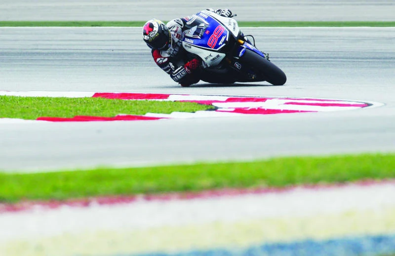 Lorenzo edges out Pedrosa to take pole