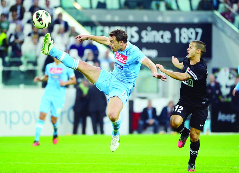 Caceres, Pogba strike as Juve goes clear of Napoli