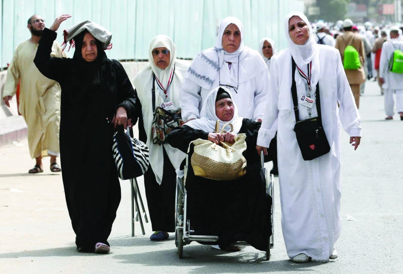 Pilgrims overcome linguistic barriers with signs, gestures